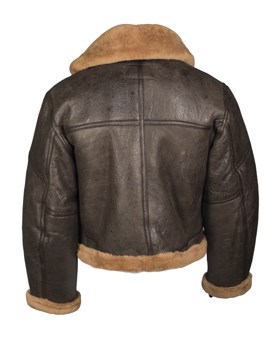 Blouson aviateur type RAF Mil-Tec en peau lainée d'agneau avec demi-ceinture à boucle laiton