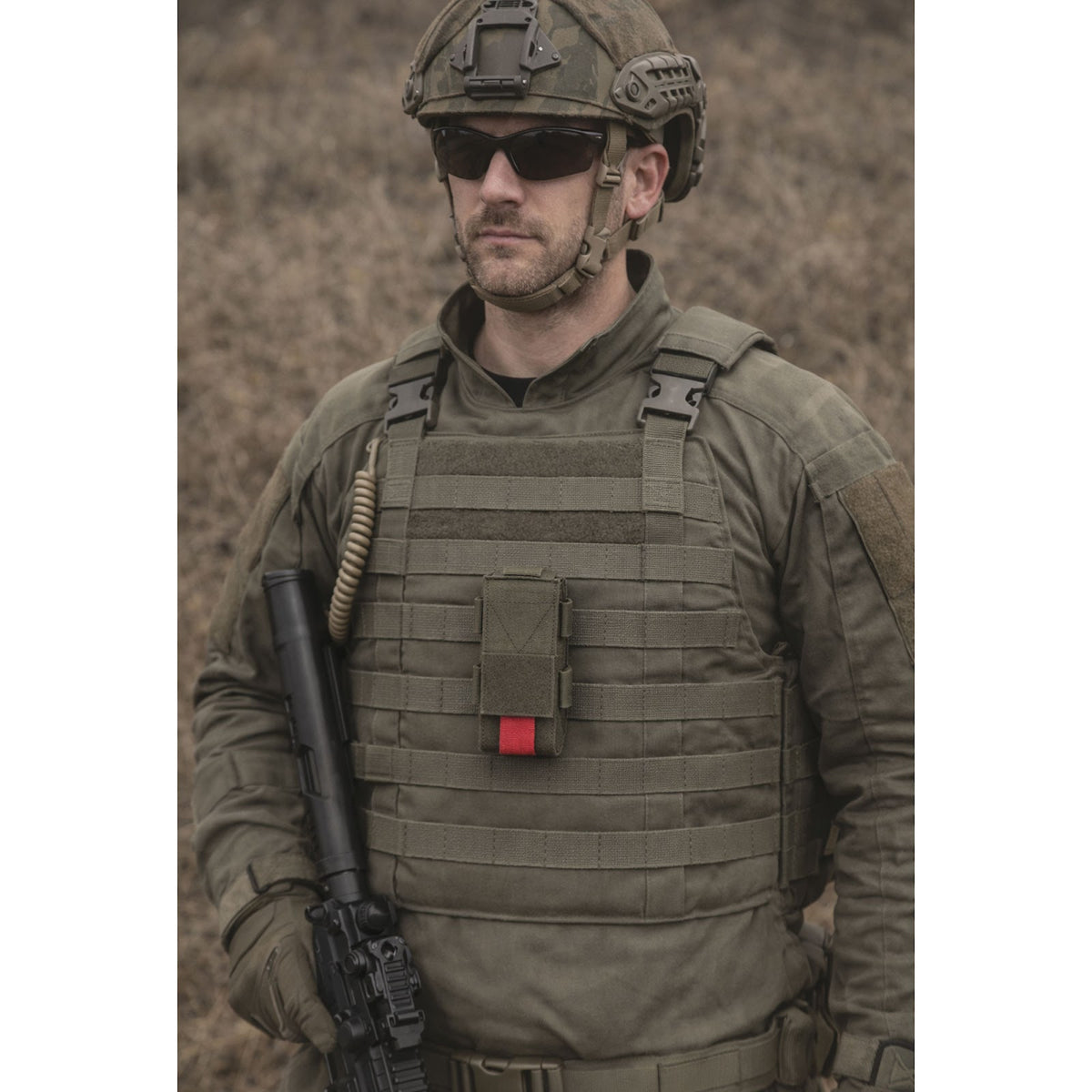 Porte-garrot en polyester attaches MOLLE et passant de ceinturon