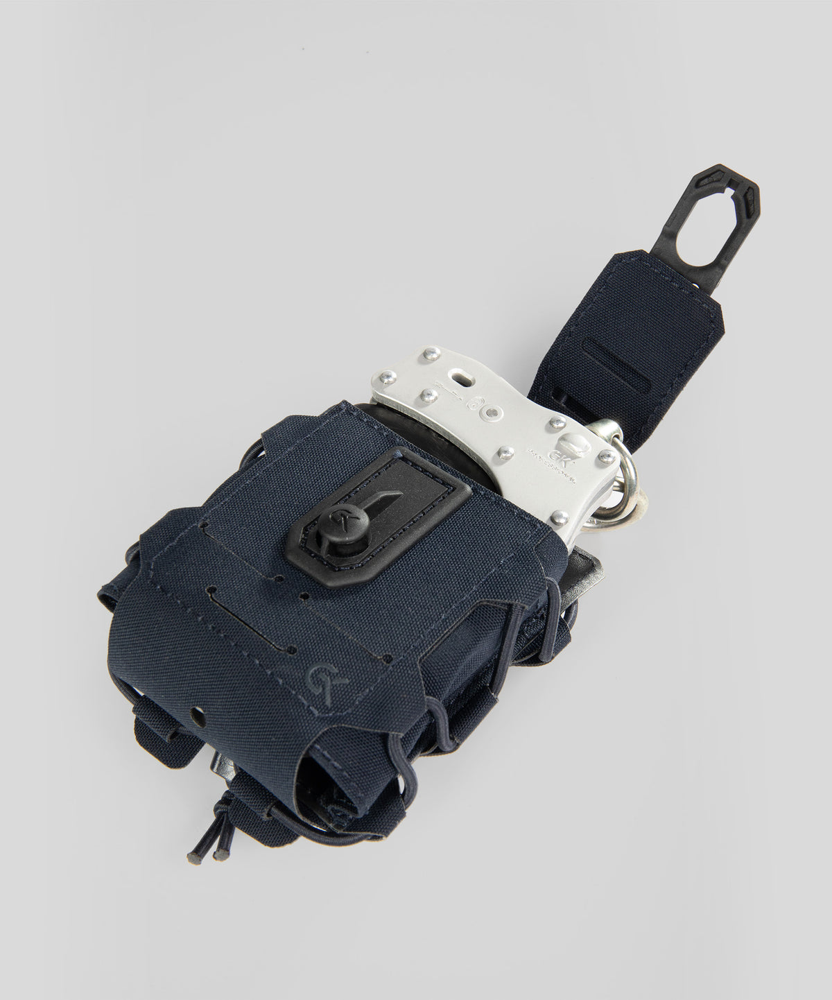 Porte-menottes GK Dutycall à rabat sur platine MOLLE en deux finitions
