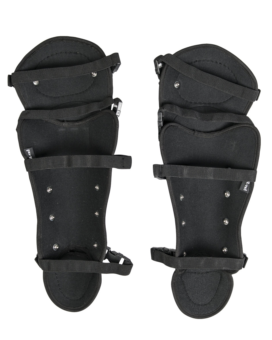 Protège-tibia Mil-Tec Anti Riot à coque polyéthylène, mousse EVA et fermetures rapides