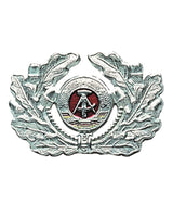 Couronne de casquette de soldat des forces terrestres est-allemandes