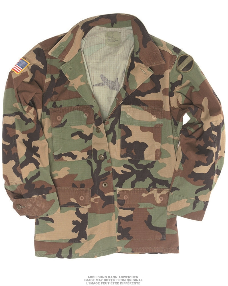 Veste de combat BDU américaine livrée avec ses insignes, pièce d'occasion
