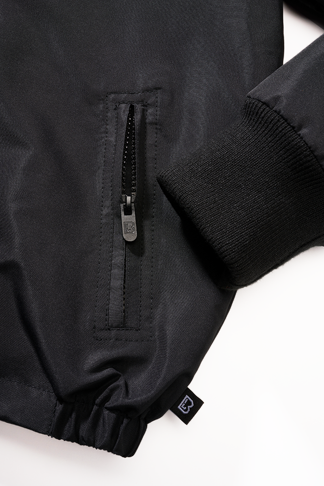 Coupe-vent enfant Brandit Frontzip doublure polaire capuche et trois poches fermées