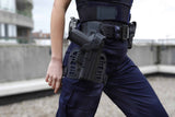 Holster GK Pro à double sécurité avec arceau verrouillable et déflecteur latéral
