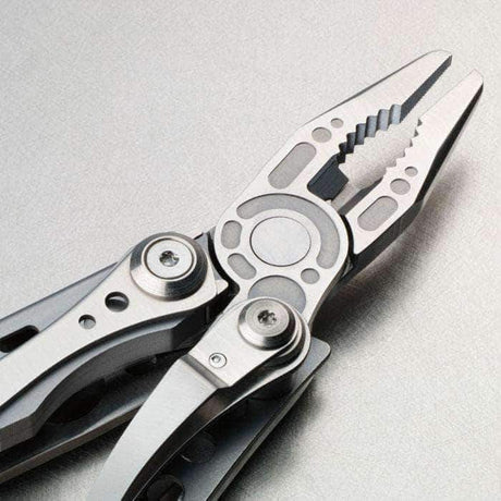 Pince multifonctions Leatherman Skeletool 7 outils, mousqueton-décapsuleur intégré