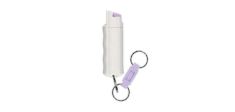 Aérosol lacrymogène Sabre Red 25 giclées boîtier phosphorescent porte-clés