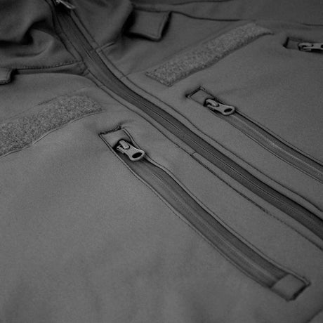 Veste softshell Mil-Tec Tactical Plus laminé trois couches colonne 8000 mm avec boucles pouces et compartiments protection